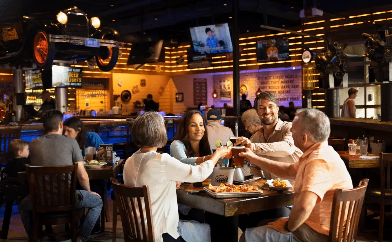Group Enjoying Dinner at Ford's Garage